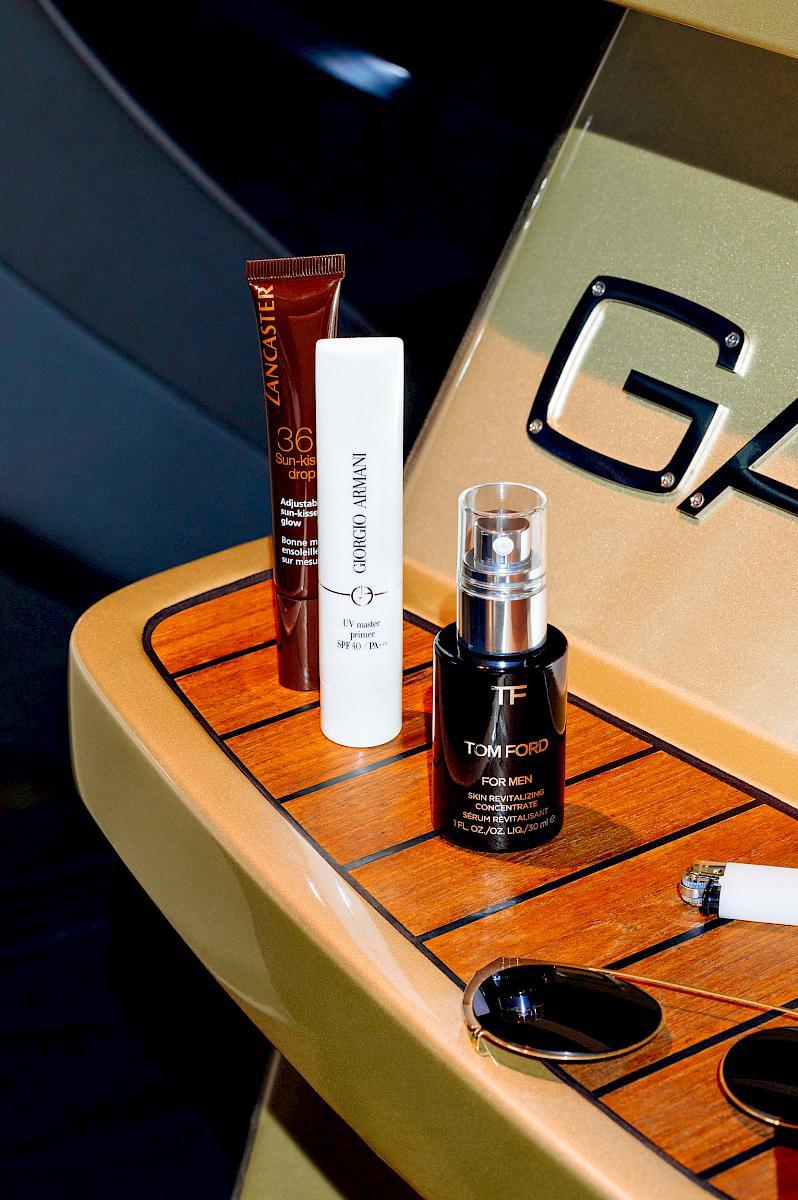 Sun-kissed-drop Lancaster, UV Master Primer Giorgio Armani, Sun Revitalising Concentrate Tom Ford on an Ovation 7.6 speedboat by Ganz Boats