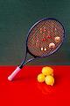 Tennis Racket as an earring holder with Lemons as balls