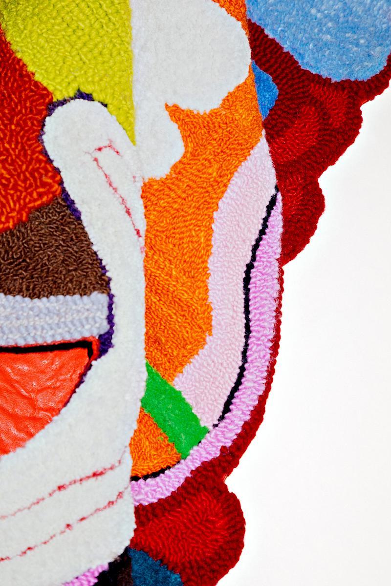 Close-up of the art piece Soft Sculpture CUNT power by Talaya Schmid