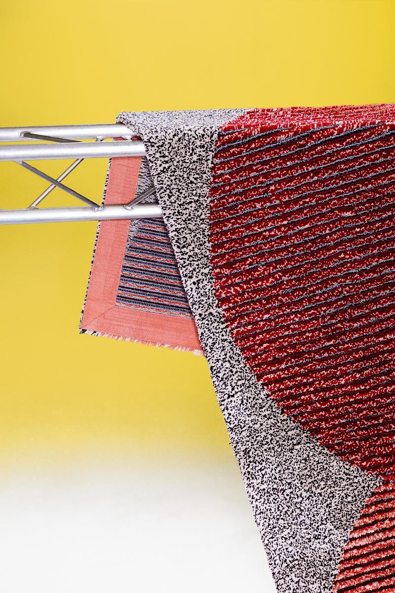 A close-up of a Diffract rug by Studio Laure Kryenbuehl